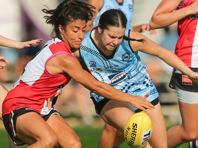 Buffs Dominique Carbone  and District's Maria Moussa  Southern Districts V Buffettes at Marrara No 2 .Picture GLENN CAMPBELL