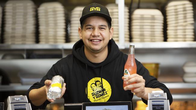 International student Miguel Reyes was able to secure a job at a Guzman y Gomez outlet, which means he can afford to continue to study in SA. Picture: Emma Brasier