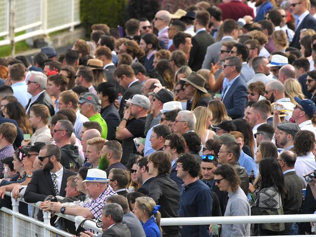 Crowd gather to watch race 5, the Bisley Workwear Premiere Stakes during Epsom Handicap Raceday at Royal Randwick Racecourse in Sydney, Saturday, October 5, 2019. (AAP Image/Simon Bullard) NO ARCHIVING, EDITORIAL USE ONLY