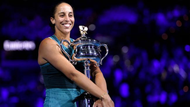 Madison Keys celebrates with the Daphne Akhurst Memorial Cup. (Photo by Martin KEEP / AFP)