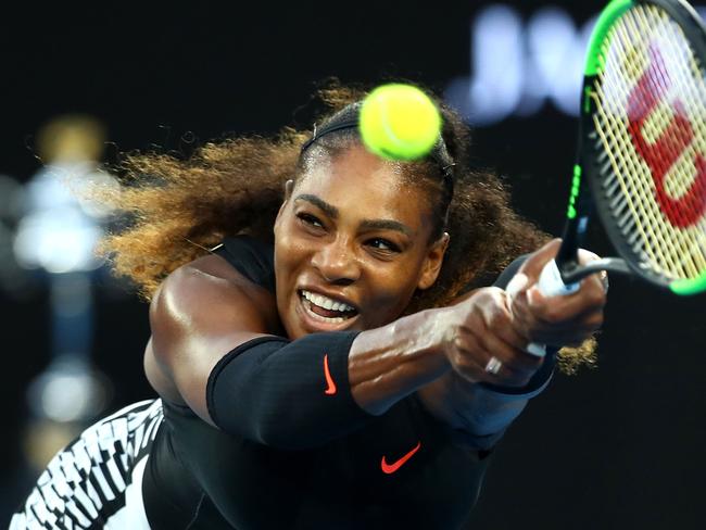 MELBOURNE, AUSTRALIA - JANUARY 28:  Serena Williams of the United States plays a backhand in her Women's Singles Final match against Venus Williams of the United States on day 13 of the 2017 Australian Open at Melbourne Park on January 28, 2017 in Melbourne, Australia.  (Photo by Clive Brunskill/Getty Images)