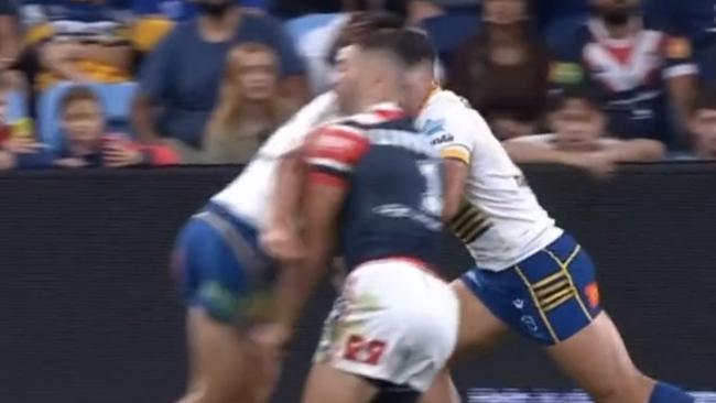 James Tedesco is hit high by Eels winger Baily Simonsson.