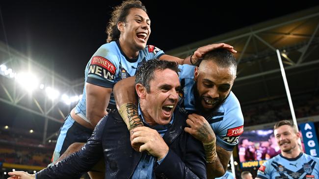 Brad Fittler and his players celebrate their big win in Brisbane last month.