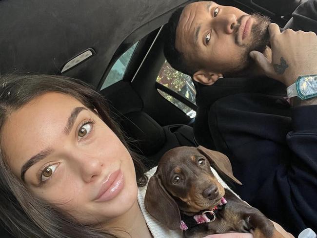 Nick Kyrgios with his girlfriend, Costeen Hatzi, and their sausage dog. Picture: Supplied