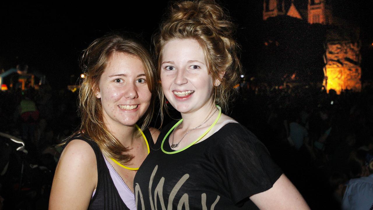 2010: New Year’s Eve celebrations at Timothy Moloney Park. Emma Johnson and Kate Pearson of Ipswich. Photo: David Nielsen