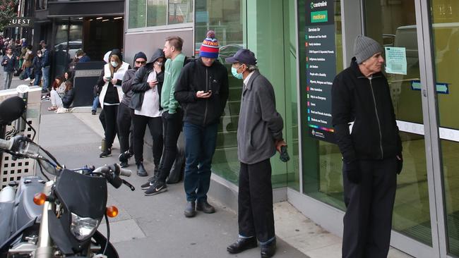 Long queues have been forming outside Centrelink offices around the country this week. Picture: David Crosling