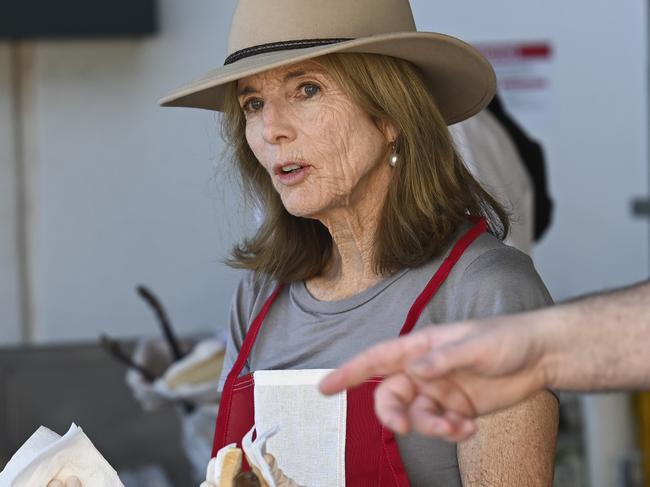 CANBERRA, AUSTRALIA, NewsWire Photos. FEBRUARY 25, 2024: U.S. Ambassador Caroline Kennedy, husband Edwin Schlossberg along with the U.S. Embassy team cook and serve sausages at Bunnings, Majura Park in Canberra to raise funds for the Cancer Council ahead of her participation in the Autumn Shitbox Rally. Picture: NCA NewsWire / Martin Ollman