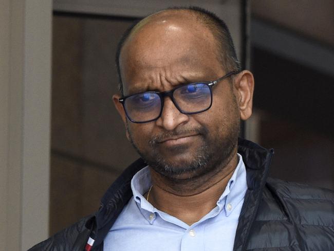 Madira Ginnige, the director of AIMS High Academy in Mount Waverley, leaves the Melbourne Magistrates Court after being charged with child sex offences. Picture: Andrew Henshaw