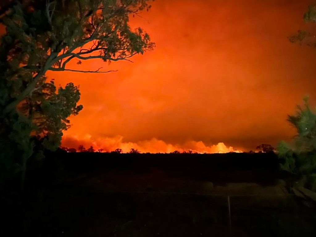 View of the inferno from the Railway Hotel Baan Baa. Picture: Supplied