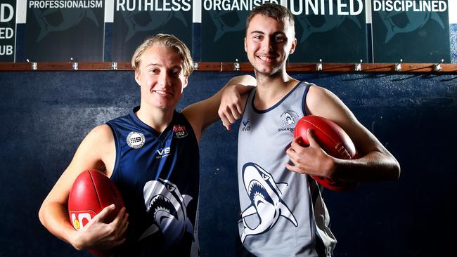 Henley Football Club C7 player Dylan Haines-West with Sharks’ A-grader Brock Kennedy. Picture: Sarah Reed