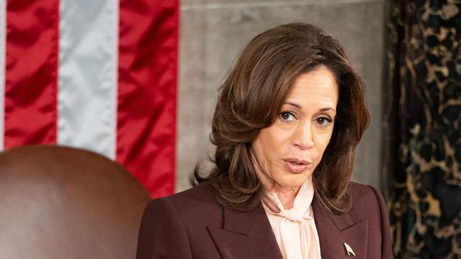 US Vice President Kamala Harris presides over a joint session of Congress to certify the results of the 2024 Presidential election, inside the House Chamber at the US Capitol on January 6, 2025, in Washington, DC. Exactly four years after Donald Trump's supporters stormed the US Capitol, seeking to overturn his election loss, lawmakers meet today to certify his 2024 Presidential win, cementing the Republican's comeback from political ignominy. (Photo by Allison ROBBERT / AFP)