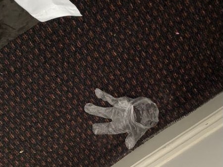 A second used glove was left behind in one of the two adjoining rooms. Image supplied.