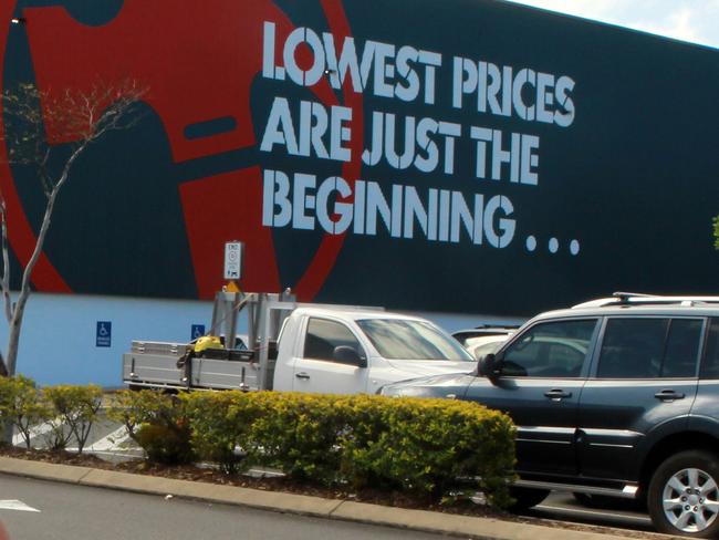 Public opinion is divided whether Bunnings Warehouse should allow dogs inside the store or not. Alexander Leguizamon and his Blue Heeler puppy Ginger often visit Bunnings. Picture by Scott Fletcher