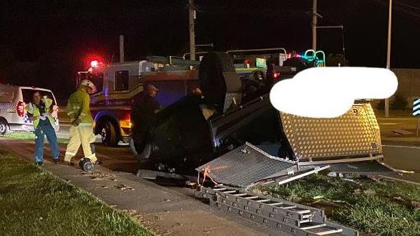 The ute rollover at Hope Island. Picture: Hope Island News &amp; Crime and Community/Facebook