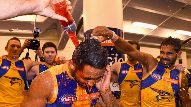 Former West Coast winger Malcolm Karpany is showered with gatorade by teammates after the Eagles beat the Bulldogs in 2017. Karpany will feature with South Adelaide in 2019 after being delisted by the Eagles. Picture: Quinn Rooney/Getty Images