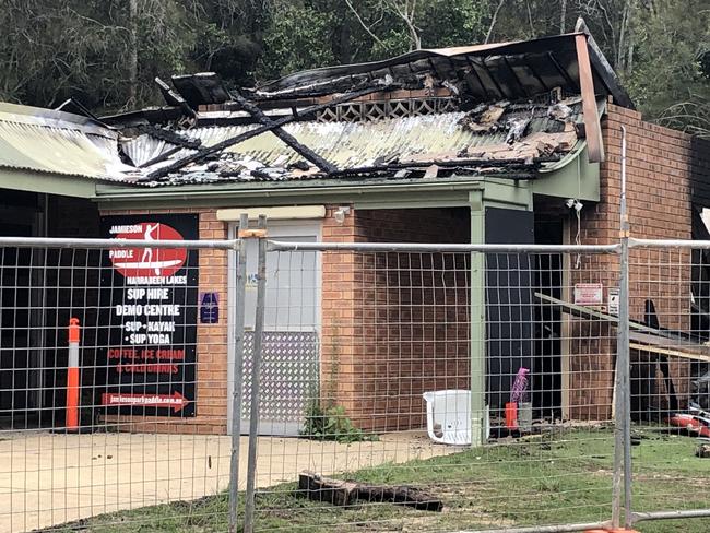 The burnt out remains of the Jamieson Park Paddle paddleboard and kayak rental business. Picture: Jim O'Rourke