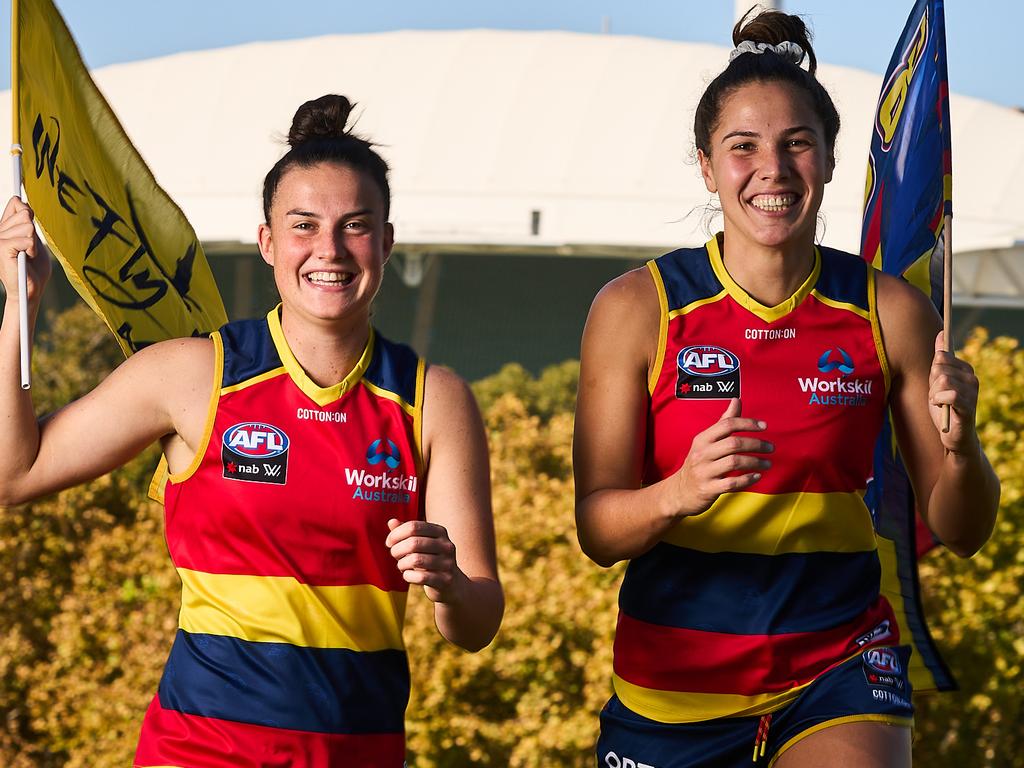 Crows footballers Eloise Jones and Allen with Adelaide Oval in the background. Picture: Matt Loxton