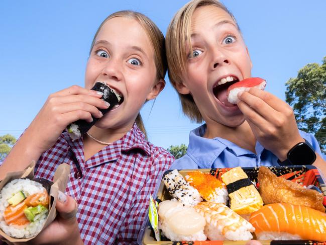 School canteens are selling healthier and more diverse food, twins Josh, 11 and Scarlett, 11 McLean with a sushi lunch.Picture: Jason Edwards