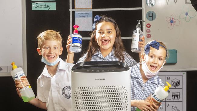 Lenny, Ayda and Sienna know the drill at St John Vianney Primary School. Picture:Rob Leeson.