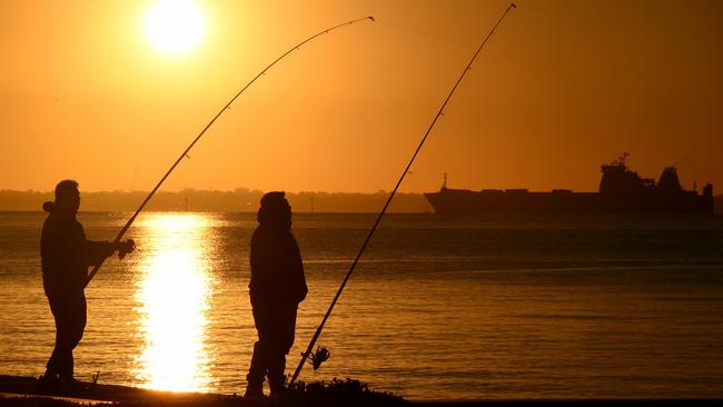 Early bird anglers beating the crowds to catch a feast on Christmas Eve. Picture: Nicole Garmston