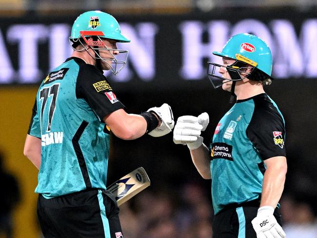 BRISBANE, AUSTRALIA - JANUARY 06: Max Bryant and Matt Renshaw of the Heat pump fists during the BBL match between Brisbane Heat and Sydney Thunder at The Gabba, on January 06, 2025, in Brisbane, Australia. (Photo by Bradley Kanaris/Getty Images)