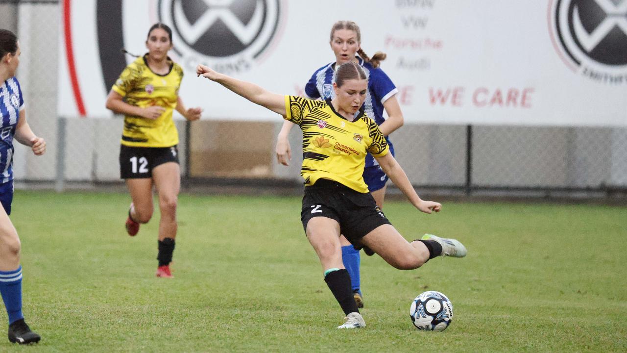 Liberty Berman-Hardman strikes the ball in the Kappa Queensland Cup Round 5 regional women's match between the Edge Hill Tigers and Townsville Brothers, held at Tiger Park, Manunda, Cairns. Picture: Brendan Radke