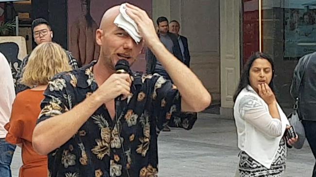 Busker Matt Eberhart after he was attacked on Rundle Mall while dressed as a banana. Pictures: Shaun Hollis