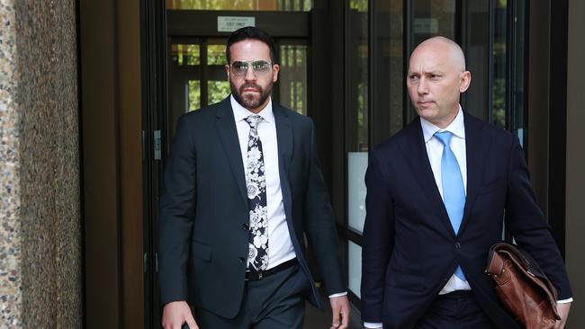 Vince Tesoriero with his lawyer as they leave the Sydney Federal Court during last year’s $500m fraud case. Picture: Jane Dempster