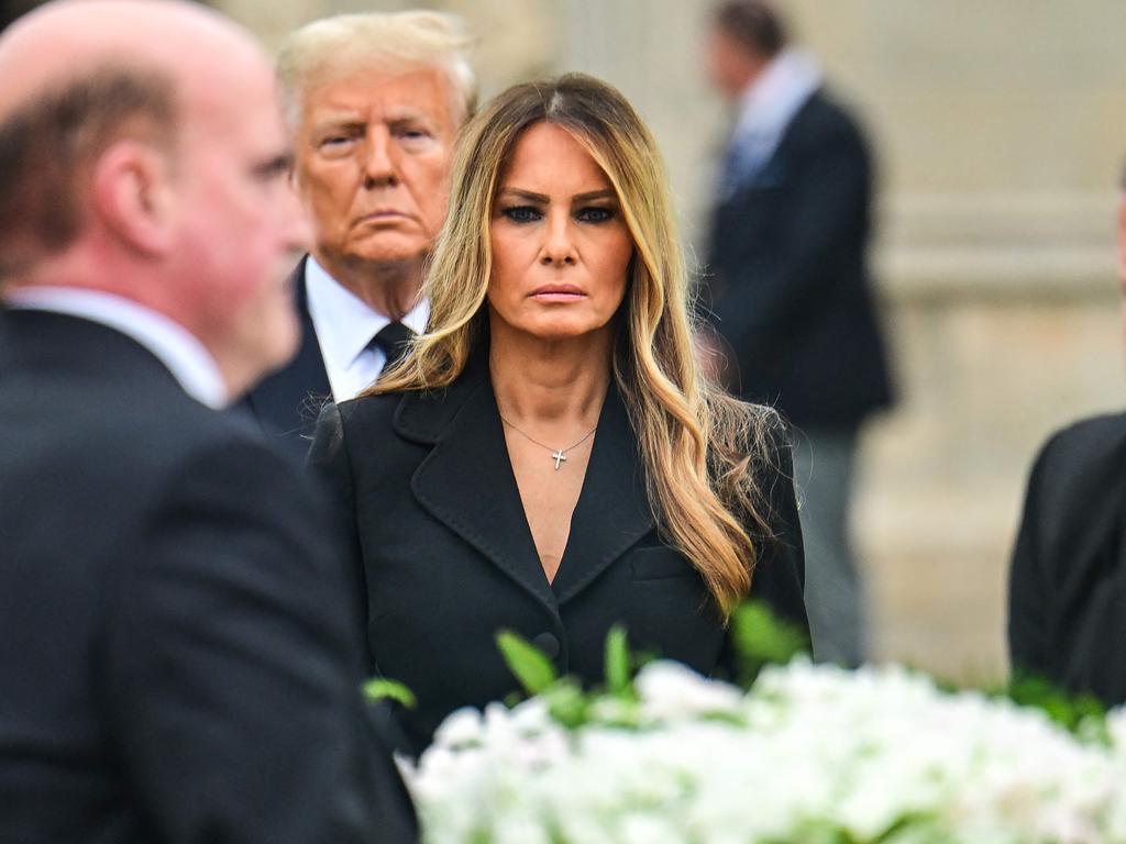 Melania Trump, flanked by Donald Trump, leaves the funeral service for her mother, Amalija Knavs, at the Church of Bethesda-by-the-Sea in Palm Beach, Florida. Picture: Giorgio Viera/AFP