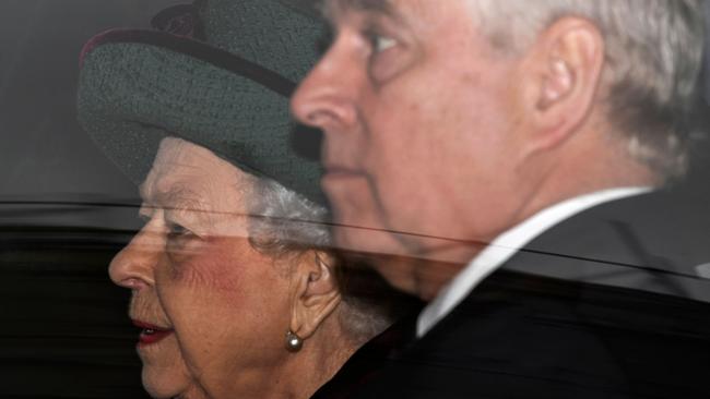 The Queen and Prince Andrew leave by car after attending a Service of Thanksgiving for Britain's Prince Philip. Picture: JUSTIN TALLIS / AFP.