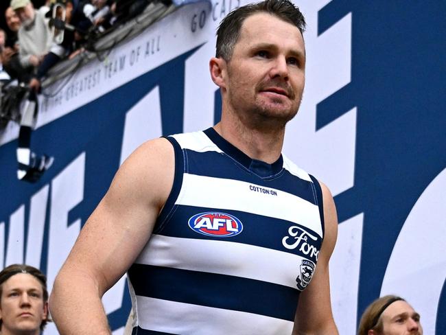 MELBOURNE, AUSTRALIA - SEPTEMBER 21: Patrick Dangerfield (c) of the Cats leads the team out during the AFL Preliminary Final match between Geelong Cats and Brisbane Lions at Melbourne Cricket Ground, on September 21, 2024, in Melbourne, Australia. (Photo by Quinn Rooney/Getty Images)