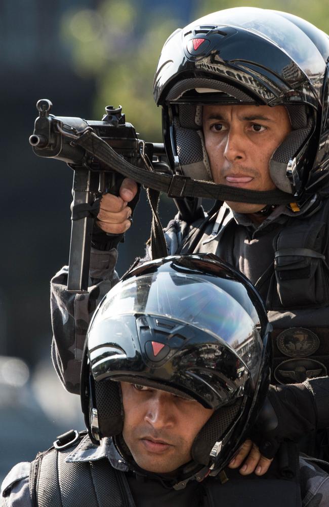 The Special Riot Police unit carries out a drill for controlling civil disorders at their headquarters in Rio de Janeiro.