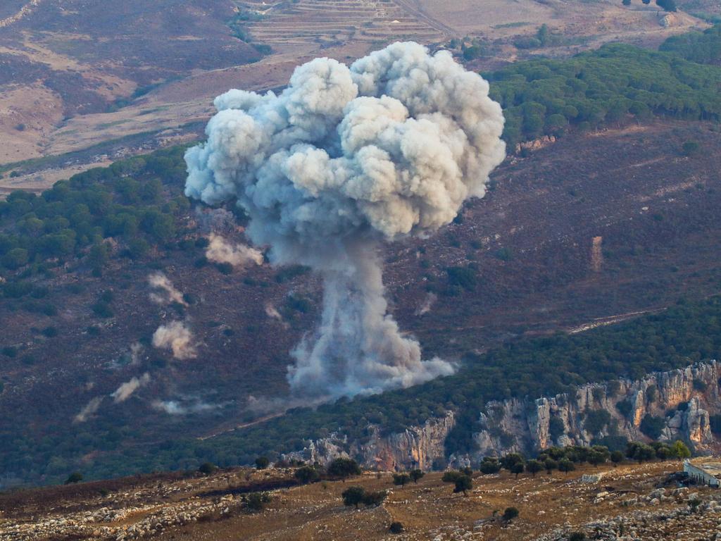 Smoke billows from the site of an Israeli air strike in Marjayoun, near the Lebanon-Israel border.