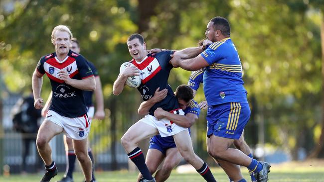 Toby Elliott in action for Erina. Picture: Sue Graham