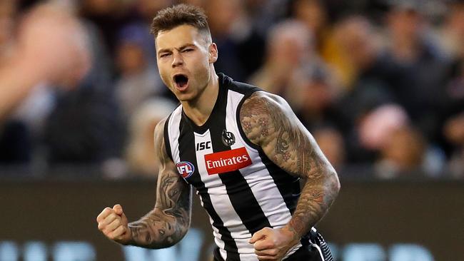 Jamie Elliott celebrates a goal during Collingwood’s win over Essendon. Picture: