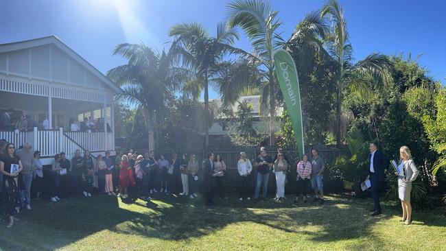 A large crowd gathered to watch the 48 Celia St, Ashgrove auction.