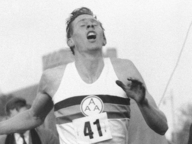 FILE - In this May 6, 1954 file photo, Britain's Roger Bannister hits the tape to break the four-minute mile in Oxford, England. A statement released Sunday March 4, 2018, on behalf of Bannister's family said Sir Roger Bannister died peacefully in Oxford on March 3, aged 88. (AP Photo/File)