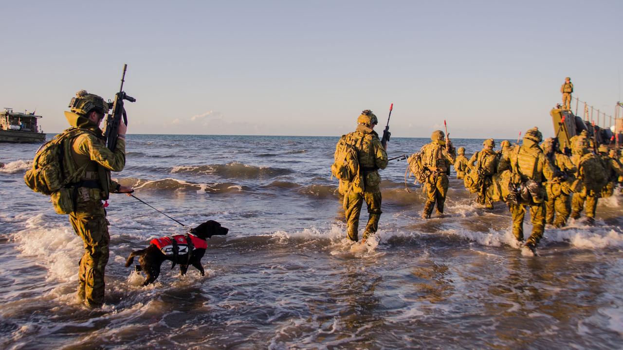 Soldiers and military working dogs of the Australian Amphibious Force. Picture: