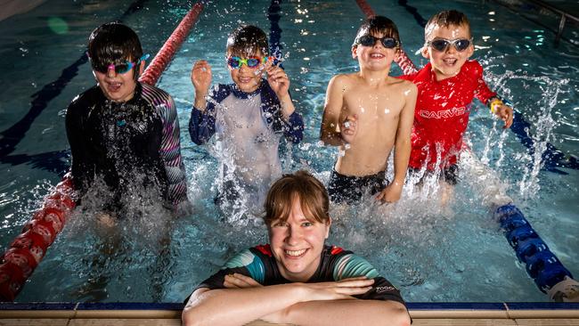 Swim teacher Alicia Glover with her students Sam, Cameron, Tom and Ben. Picture: Jake Nowakowski