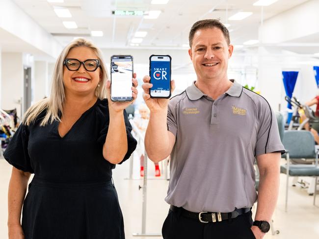 Mater Private Hospital Townsville rehabilitation physiologist Shaun Whiley and Smart Precinct NQ CEO Cassandra Cazzulino demonstrate the MAJR and Cardihab smartphone apps. Mater has launched two digital programs which are improving the treatment of patients needing hip and knee surgery and those recovering from heart conditions or surgery. Picture: Supplied