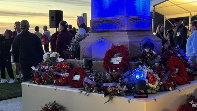 Veterans, local Gold Coast councillors, politicians and community leaders laid wreaths at the base of the Southport memorial statue. Photo: Amaani Siddeek