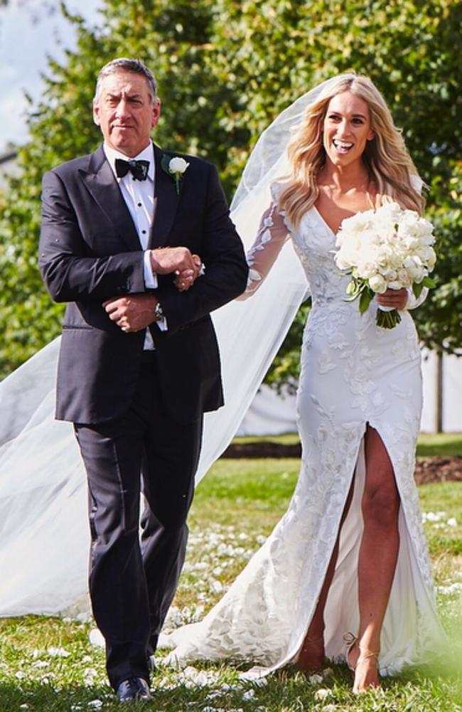 Mitch Hooke walks daughter Phoebe to the alter to marry Sam Burgess in Bowral.