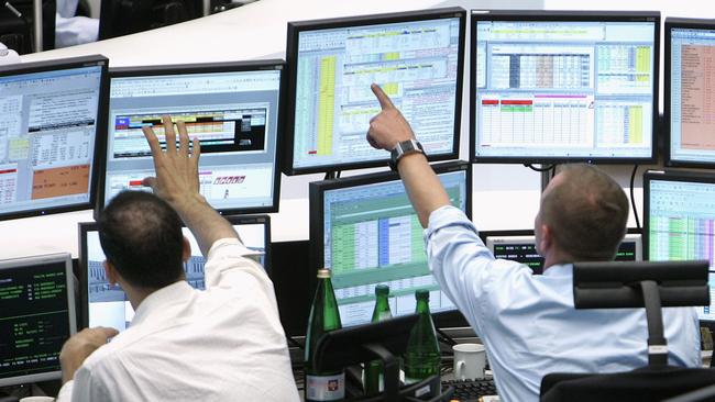 Brokers at the stock market in Frankfurt.