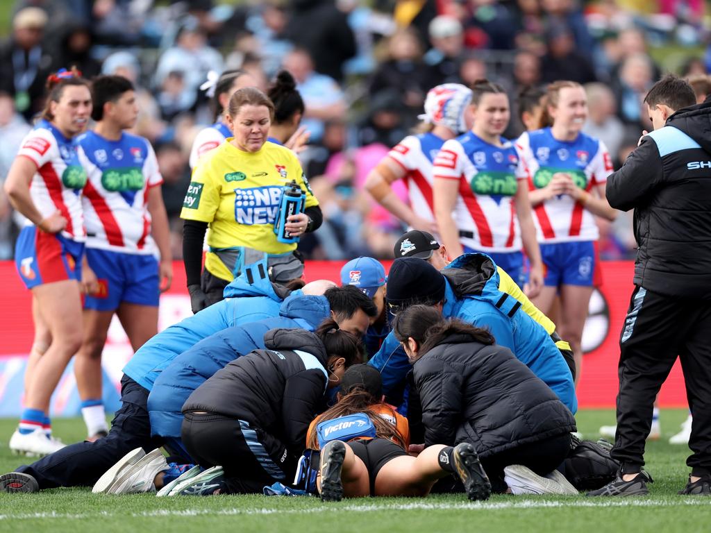 Talei Holmes is treated after a nasty head knock. Picture: Brendon Thorne/Getty Images