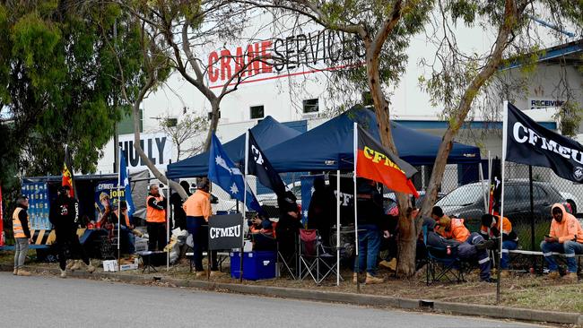 CFMEU members striking outside Crane Services in Wingfield over a wage dispute. Picture: Naomi Jellicoe