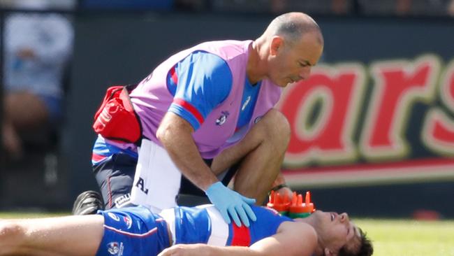 BALLARAT, AUSTRALIA – MARCH 03: Liam Picken of the Bulldogs lies on the field injured during the AFL JLT Community Series match between the Western Bulldogs and the Hawthorn Hawks at Mars Stadium on March 3, 2018 in Ballarat, Australia. (Photo by Scott Barbour/Getty Images)