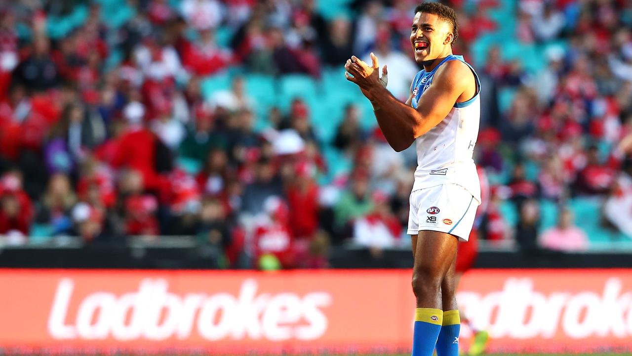 Touk Miller celebrates a goal in the upset win over Sydney a few weeks ago.