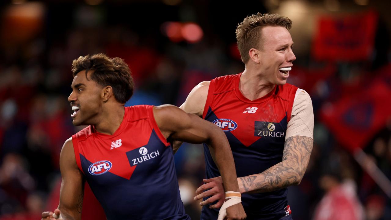 ADELAIDE, AUSTRALIA - AUGUST 28: James Harmes and Kysaiah Pickett of the Demons celebrate a goal during the 2021 AFL First Qualifying Final match between the Melbourne Demons and the Brisbane Lions at Adelaide Oval on August 28, 2021 in Adelaide, Australia. (Photo by James Elsby/AFL Photos via Getty Images)