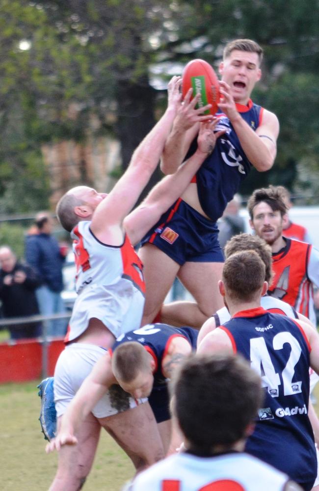 Corey Hutchinson soars for a speccie for Springvale Districts. Pic: Lily Cooper.