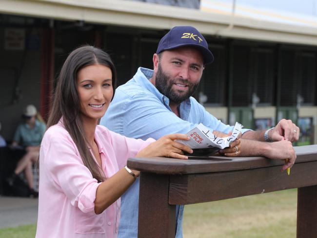 2K Thoroughbreds' Stirling Cinotta and Elise Cincotta inspect horses in the parade ring at the Magic Millions Sales. Picture Glenn Hampson